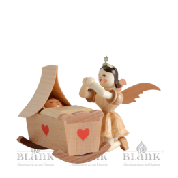 Cradle and kneeling angel