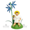 Flower Child with Siberian Squill and Bell Stick, sitting